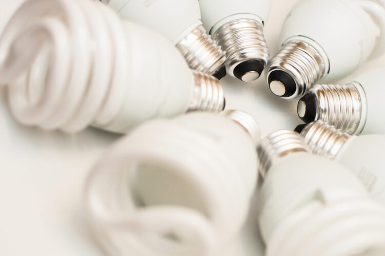 close-up spiral saving bulbs on white background