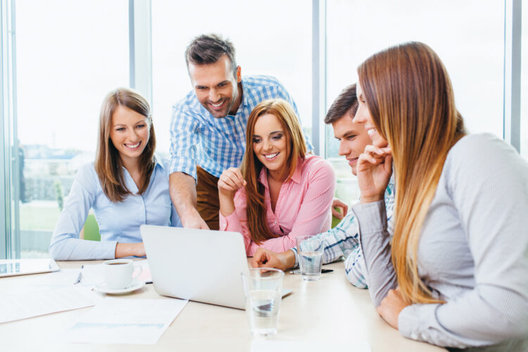 Photo of young professionals during a informal meeting